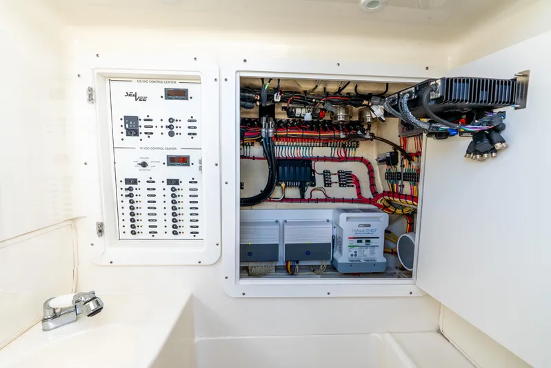  Yacht Photos Pics Electrical control panel of a 2016 SeaVee 340Z boat, showcasing wiring and components.