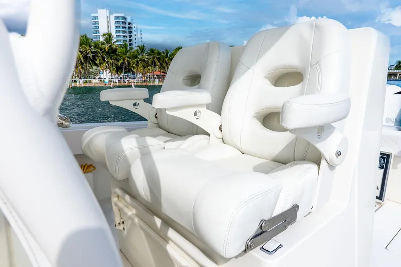  Yacht Photos Pics 2016 SeaVee 340Z boat with luxurious white leather seats, ocean view background.