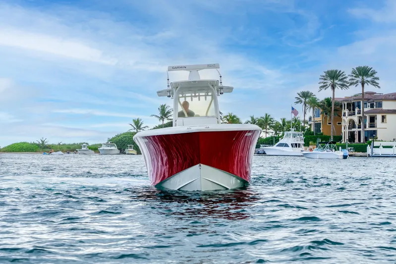  Yacht Photos Pics 2016 SeaVee 340Z boat on water near luxury waterfront homes.