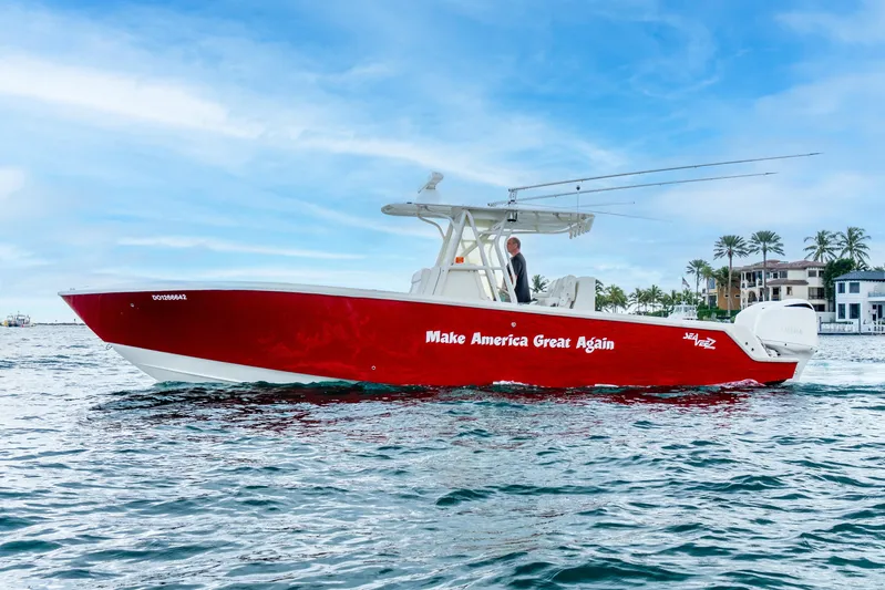  Yacht Photos Pics 2016 SeaVee 340Z boat with "Make America Great Again" slogan, cruising on water.