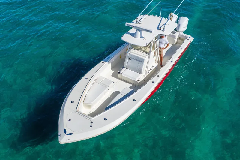  Yacht Photos Pics 2016 SeaVee 340Z boat on clear turquoise water, aerial view.