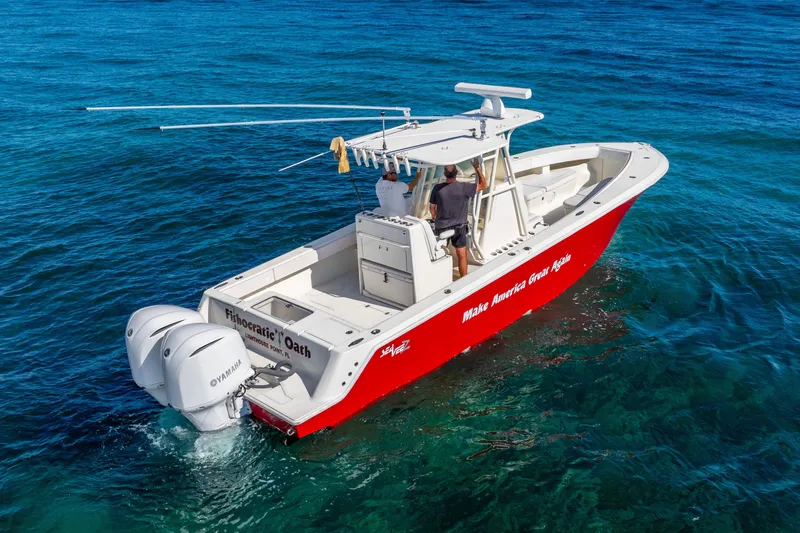  Yacht Photos Pics 2016 SeaVee 340Z boat with dual Yamaha engines on clear blue water.