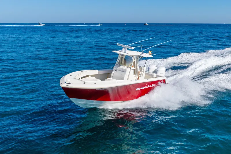  Yacht Photos Pics 2016 SeaVee 340Z boat cruising on open blue ocean waters.