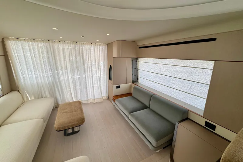  Yacht Photos Pics Luxurious interior of 2025 Azimut Fly 68 yacht with modern seating and elegant decor.
