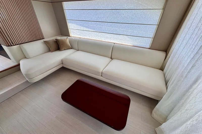  Yacht Photos Pics Luxurious interior of 2025 Azimut Fly 68 yacht with elegant white sofa and modern decor.