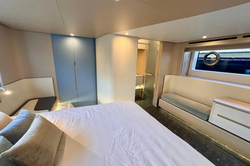  Yacht Photos Pics Luxurious interior of 2025 Azimut Fly 68 yacht, featuring modern bedroom design.