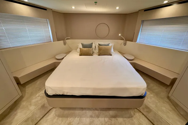  Yacht Photos Pics Luxurious bedroom interior of 2025 Azimut Fly 68 yacht with modern design.