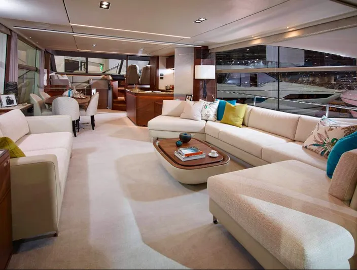  Yacht Photos Pics Luxurious interior of a 2019 Princess 75 yacht with elegant seating and modern decor.