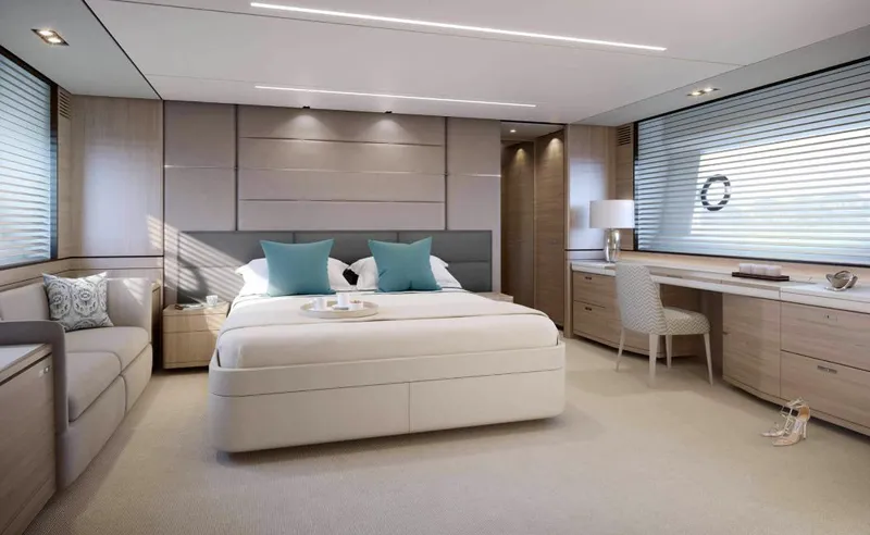  Yacht Photos Pics Luxurious bedroom interior on 2019 Princess 75 yacht with modern decor and elegant furnishings.