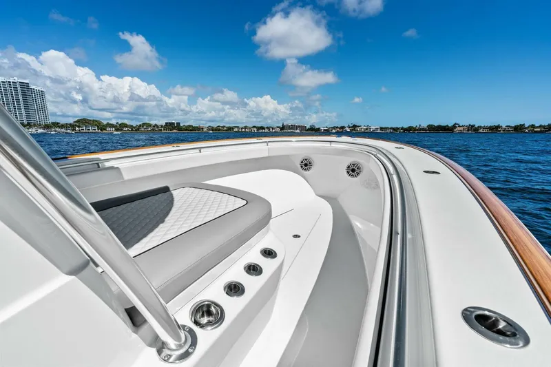 Lily Yacht Photos Pics 2021 Valhalla Boatworks V-33 on water, showcasing sleek design and luxury features.