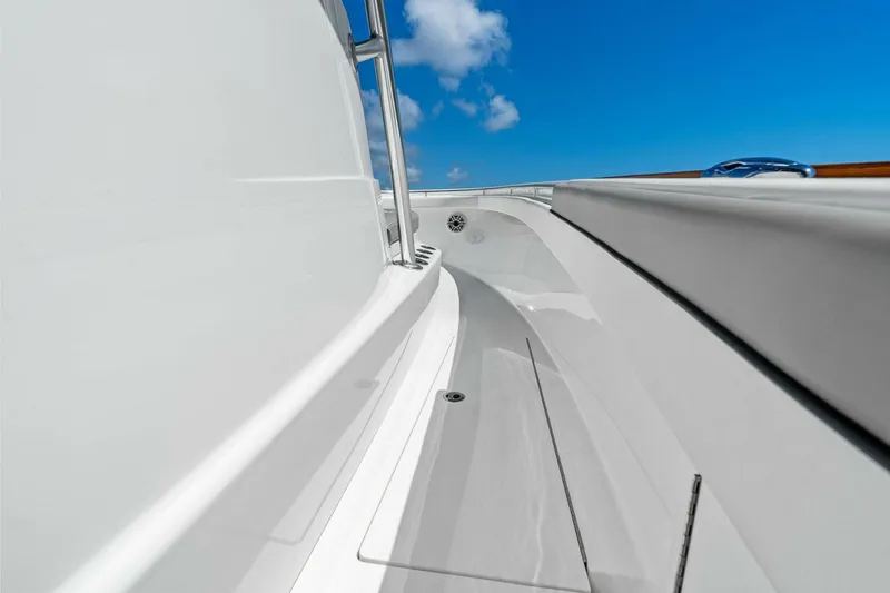 Lily Yacht Photos Pics 2021 Valhalla Boatworks V-33 deck view under clear blue sky.