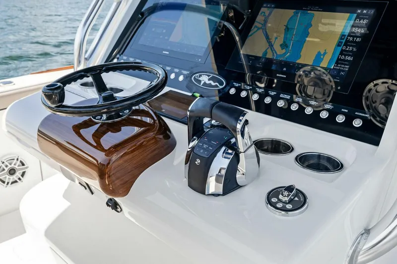 Lily Yacht Photos Pics 2021 Valhalla Boatworks V-33 helm with advanced navigation displays and controls.