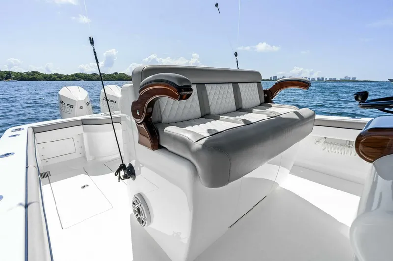 Lily Yacht Photos Pics 2021 Valhalla Boatworks V-33 interior with luxurious seating and ocean view.