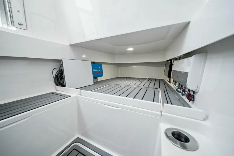 Lily Yacht Photos Pics 2021 Valhalla Boatworks V-33 interior with sleek, modern design and advanced equipment.