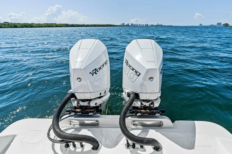 Lily Yacht Photos Pics 2021 Valhalla Boatworks V-33 with twin outboard engines on open water.