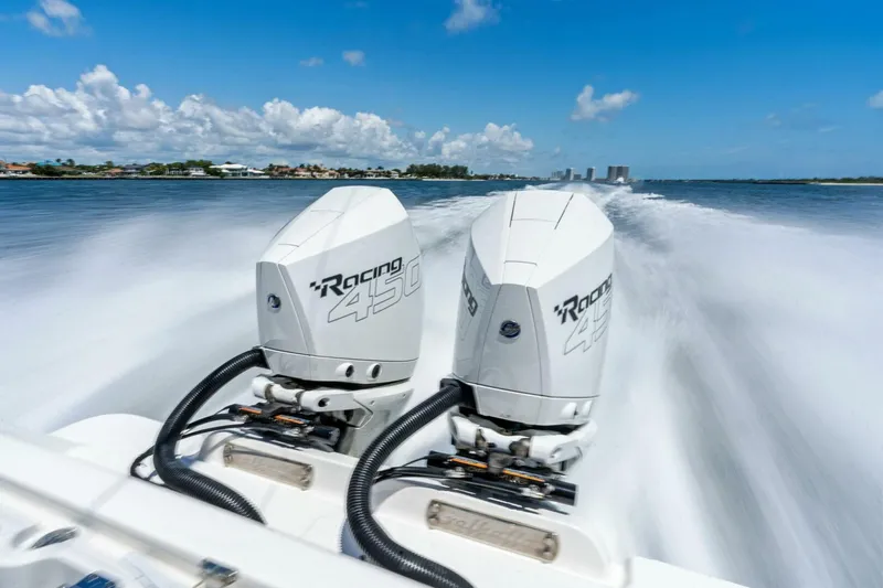 Lily Yacht Photos Pics 2021 Valhalla Boatworks V-33 with twin Racing 450 engines speeding on water.