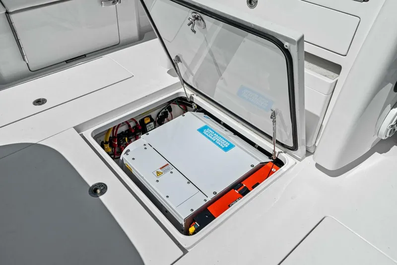 Lily Yacht Photos Pics 2021 Valhalla Boatworks V-33 electrical compartment with open hatch, showcasing internal components.