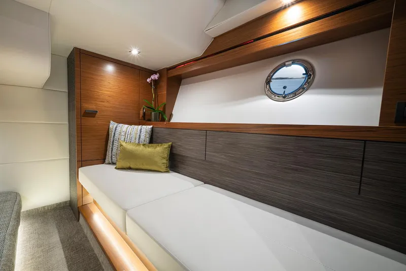  Yacht Photos Pics Manufacturer Provided Image: 2022 Tiara Yachts C39 Coupe interior cabin with modern design and porthole window.