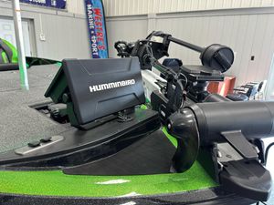 2025 Nitro Z19 boat with Humminbird fish finder and trolling motor in a showroom.
