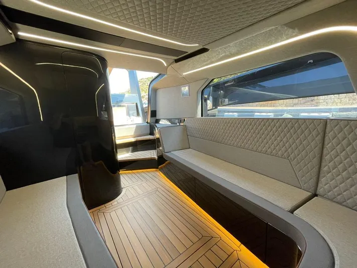 Sofia Yacht Photos Pics Luxurious interior of 2019 Maori 54 Open yacht with modern seating and ambient lighting.