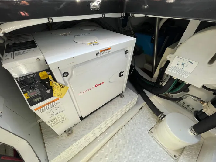 Sofia Yacht Photos Pics Cummins Onan generator in a 2019 Maori 54 Open yacht engine compartment.