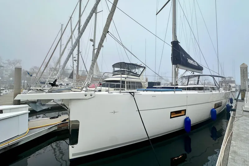 Pain Killer Yacht Photos Pics 2020 Bavaria C50 yacht docked at a marina on a foggy day.