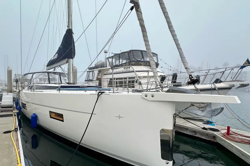 Pain Killer Yacht Photos Pics 2020 Bavaria C50 yacht docked at marina on a foggy day.
