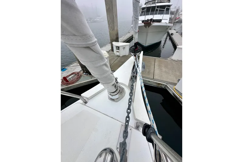 Pain Killer Yacht Photos Pics Bavaria C50 sailboat docked, showcasing deck and rigging details, 2020 model.