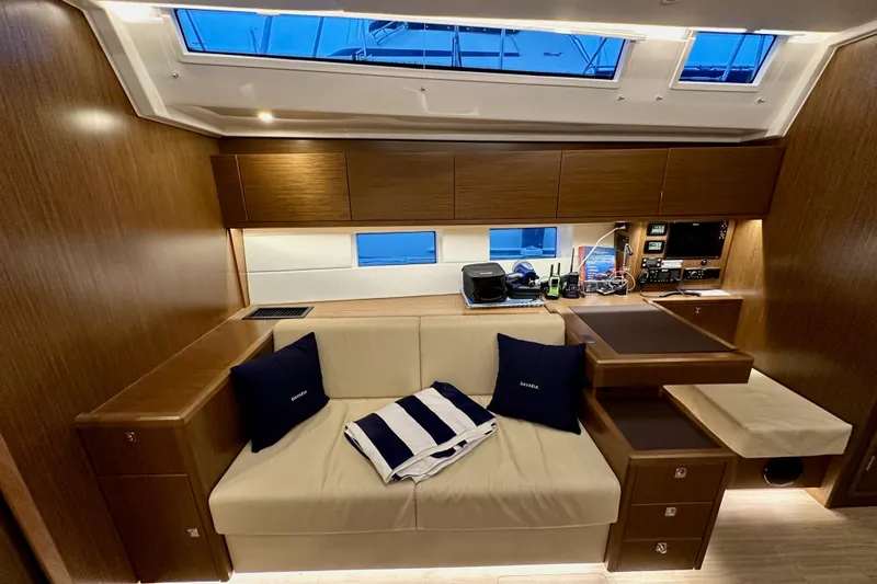 Pain Killer Yacht Photos Pics Luxurious interior of 2020 Bavaria C50 yacht with cozy seating and modern amenities.