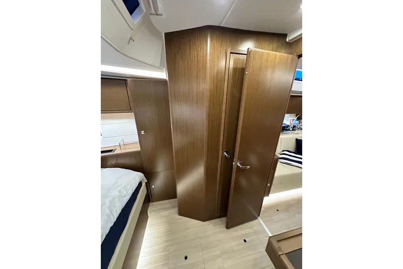 Pain Killer Yacht Photos Pics Interior of 2020 Bavaria C50 yacht, featuring wooden doors and modern design elements.