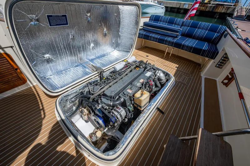 Summer Bliss Yacht Photos Pics 2001 Hinckley Picnic Boat Classic engine compartment with open hatch, showcasing detailed mechanics.