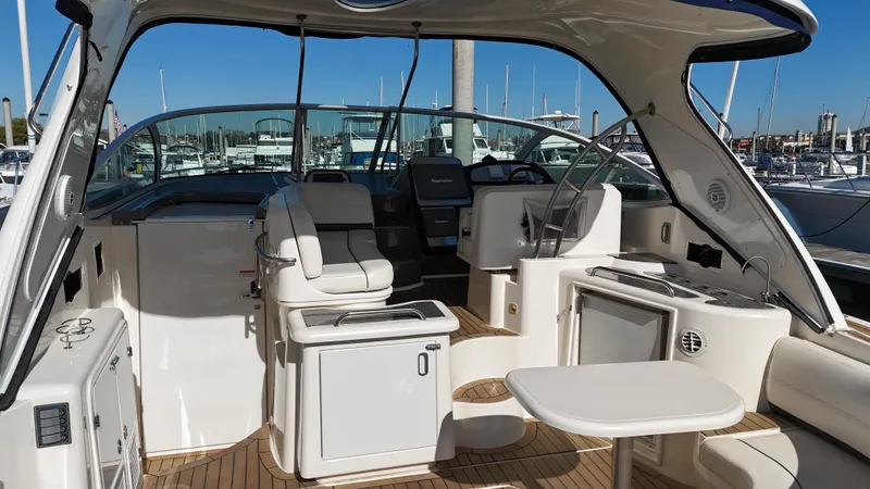 Cinta Yacht Photos Pics 2007 Cruisers Yachts 420 Express interior with seating and helm station.