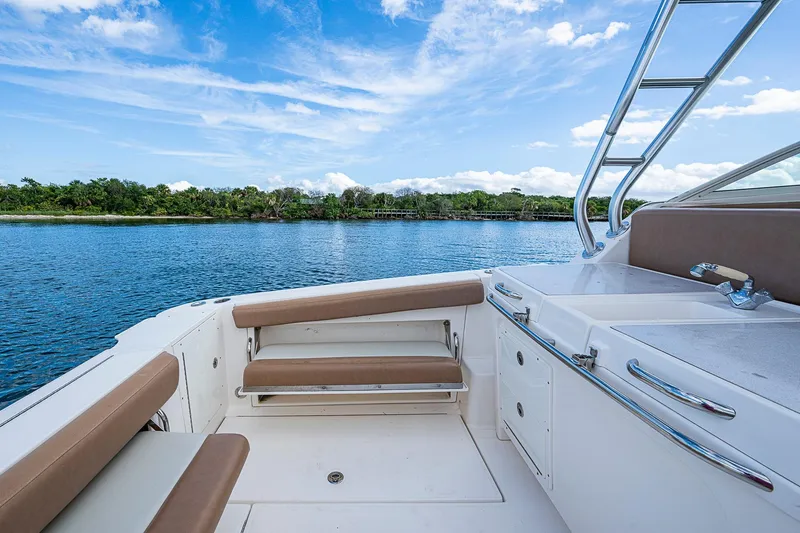  Yacht Photos Pics 2013 Wellcraft 340 Coastal boat interior with seating and water view.