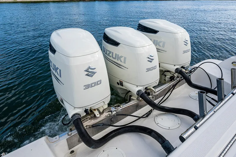  Yacht Photos Pics Triple Suzuki 300 outboard engines on a 2013 Wellcraft 340 Coastal boat.