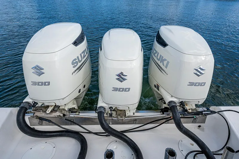  Yacht Photos Pics Triple Suzuki 300 outboard engines on a 2013 Wellcraft 340 Coastal boat.