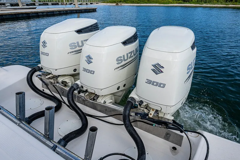  Yacht Photos Pics Triple Suzuki 300 outboard engines on a 2013 Wellcraft 340 Coastal boat.