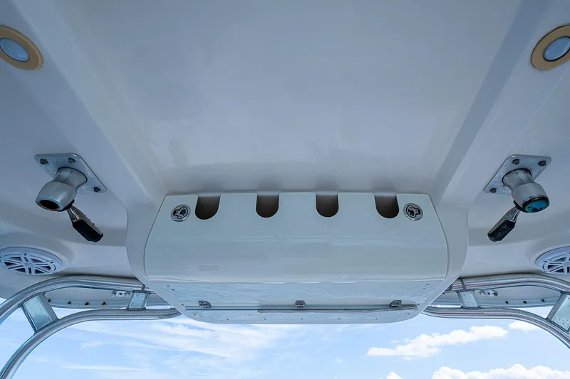  Yacht Photos Pics 2013 Wellcraft 340 Coastal boat ceiling with rod holders and speakers.