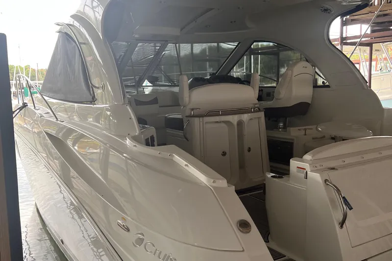  Yacht Photos Pics 2008 Cruisers Yachts 390 Sports Coupe, sleek design, spacious interior, docked at marina.