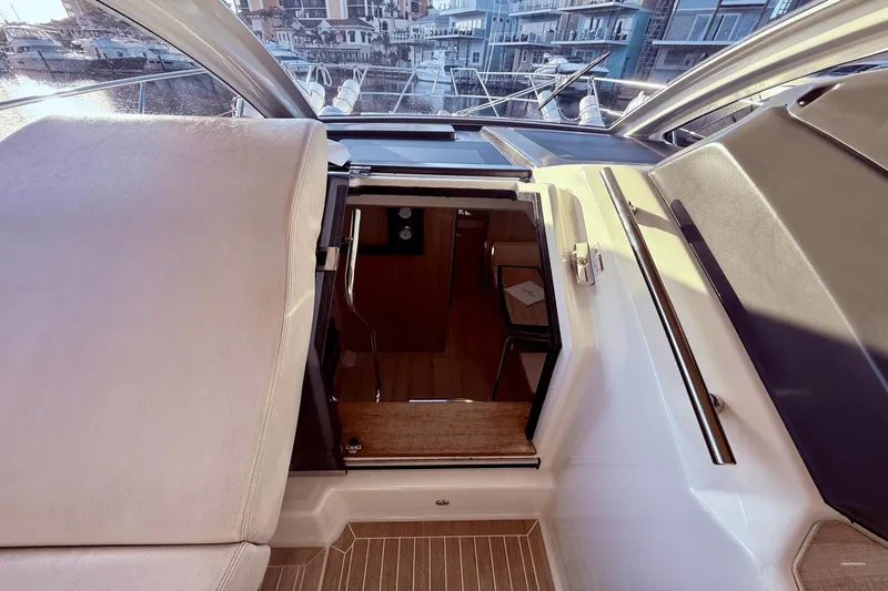 Tom's Cruise Yacht Photos Pics 2016 Cranchi M 44 HT yacht interior entrance with marina view.