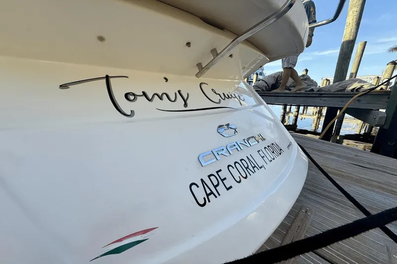 Tom's Cruise Yacht Photos Pics Cranchi M 44 HT 2016 yacht docked in Cape Coral, Florida, with custom name.