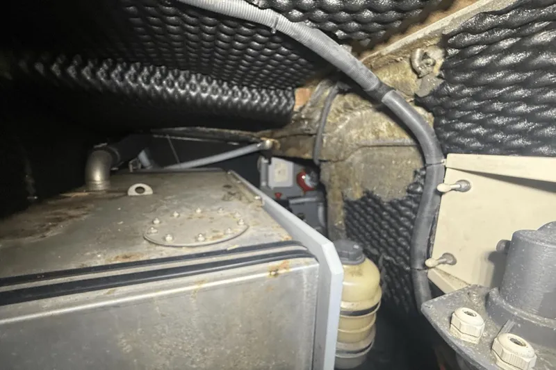 Tom's Cruise Yacht Photos Pics Engine compartment of 2016 Cranchi M 44 HT yacht, showing mechanical components and wiring.