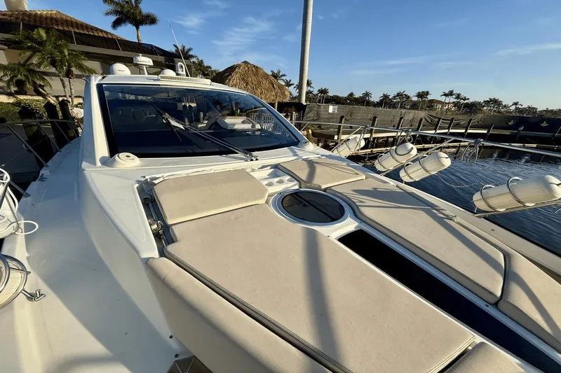 Tom's Cruise Yacht Photos Pics 2016 Cranchi M 44 HT yacht docked, featuring sleek design and spacious deck.