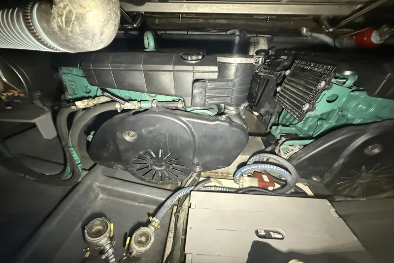 Tom's Cruise Yacht Photos Pics Engine compartment of a 2016 Cranchi M 44 HT yacht, showcasing mechanical components.