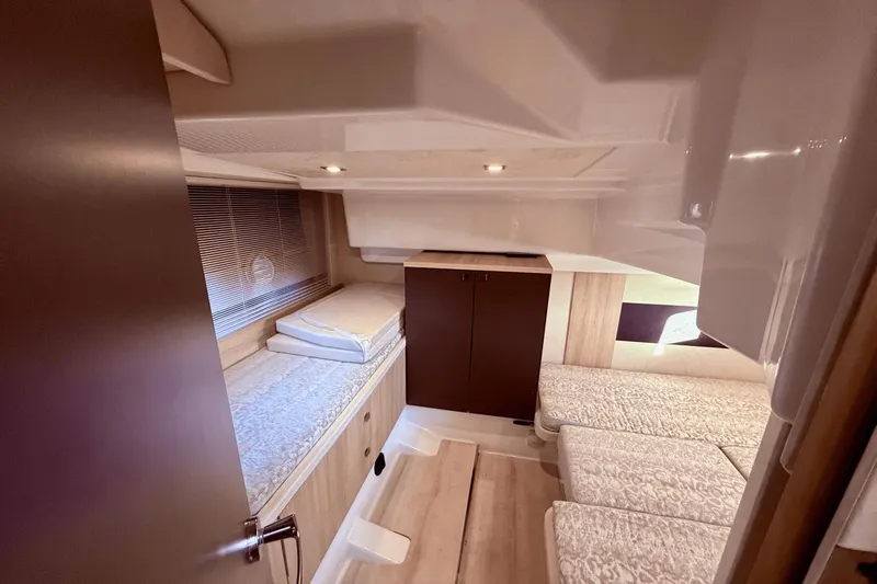 Tom's Cruise Yacht Photos Pics Luxurious interior cabin of 2016 Cranchi M 44 HT yacht with cozy bedding.