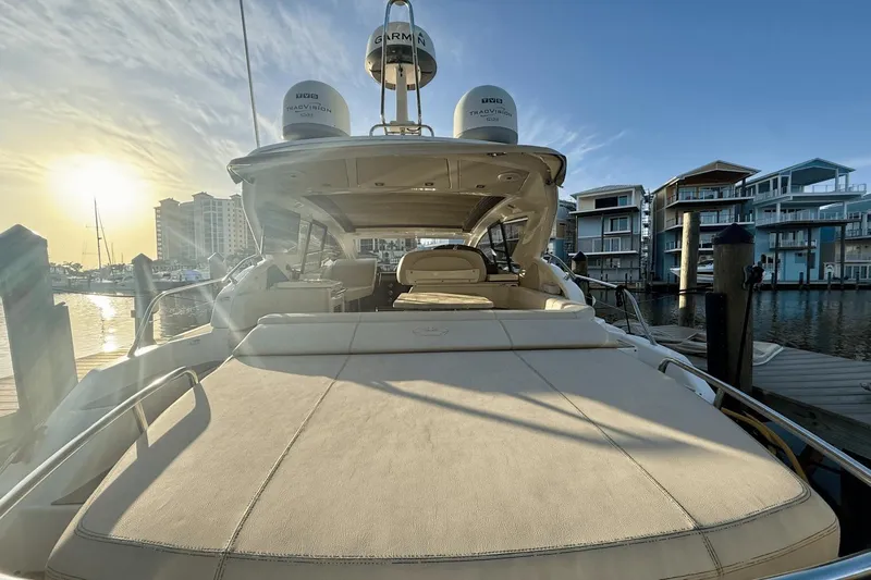 Tom's Cruise Yacht Photos Pics 2016 Cranchi M 44 HT yacht docked at marina during sunset.