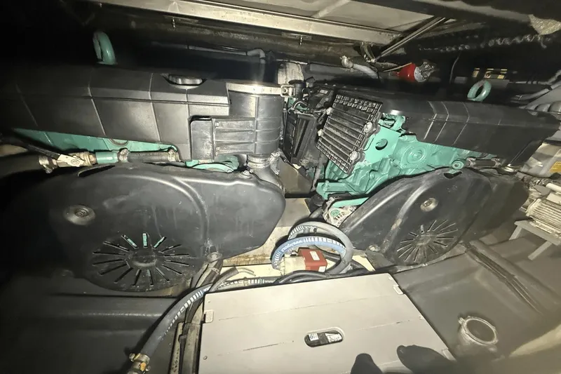 Tom's Cruise Yacht Photos Pics Engine compartment of a 2016 Cranchi M 44 HT yacht, showcasing mechanical components.