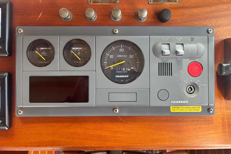 Carroll L Yacht Photos Pics Control panel of a 2001 Lowell 40 with Yanmar engine gauges and switches.