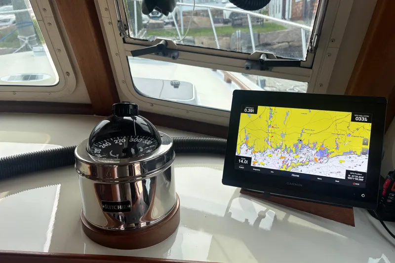 Carroll L Yacht Photos Pics Boat navigation setup with compass and Garmin GPS on Lowell 40, 2001 model.