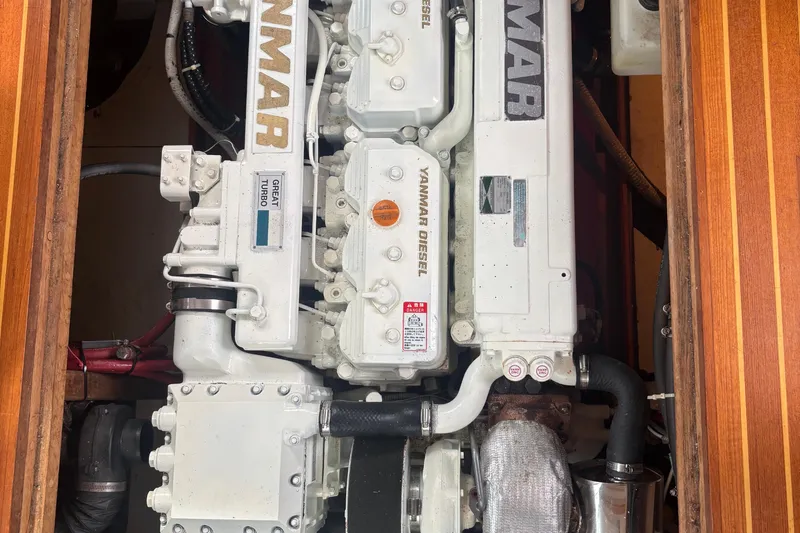 Carroll L Yacht Photos Pics Engine compartment of a 2001 Lowell 40, featuring a Yanmar diesel engine.