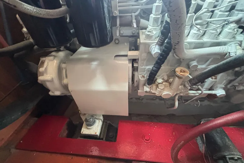 Carroll L Yacht Photos Pics Engine compartment of a 2001 Lowell 40, featuring hoses and mechanical components.